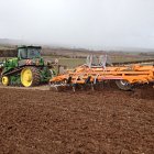 John Deere 9530T and one of our SL cultivators planting Spring Beans